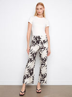 Wide-leg pants in a black and white leaf design, featuring a cropped length for a chic look by Charlie B.
