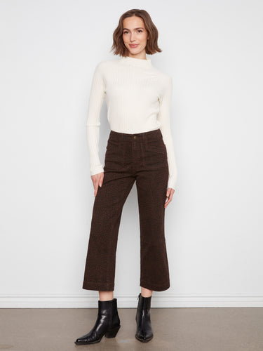 Stylish wide leg pants in a chic leopard print, perfect for adding flair to any outfit. By Charlie B.