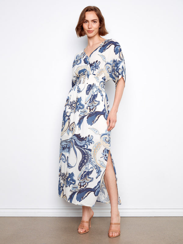 Elegant maxi dress showcasing a smocked waist, perfect for a flattering fit by Charlie B.