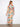 Maxi length enhances the elegance of this stunning floral dress, making it ideal for both casual and formal events by Charlie B.