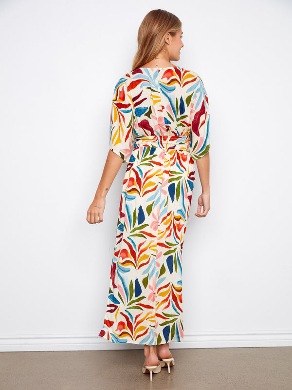 Maxi length enhances the elegance of this stunning floral dress, making it ideal for both casual and formal events by Charlie B.