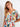The faux wrap design adds sophistication to the vivid print of this elegant maxi dress, suitable for any event by Charlie B.