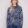 Eyelash fabric sweater with a striking abstract panther pattern, offering both style and warmth by Charlie B.