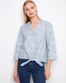 Cotton blouse with intricate eyelet pattern and a stylish Henley neckline, perfect for casual outings by Charlie B.