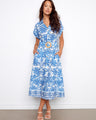 Blue and white dress with hidden pockets, featuring dolman sleeves and a stylish belt for a chic look by Charlie B.