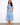 Blue and white dress with hidden pockets, featuring dolman sleeves and a stylish belt for a chic look by Charlie B.