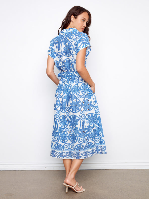 Stylish blue and white dress featuring a belt at the waist to accentuate the silhouette beautifully by Charlie B.