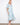 Light blue dress with a V-neck and flutter elbow sleeves, featuring a self-tie belt for added style by Charlie B.