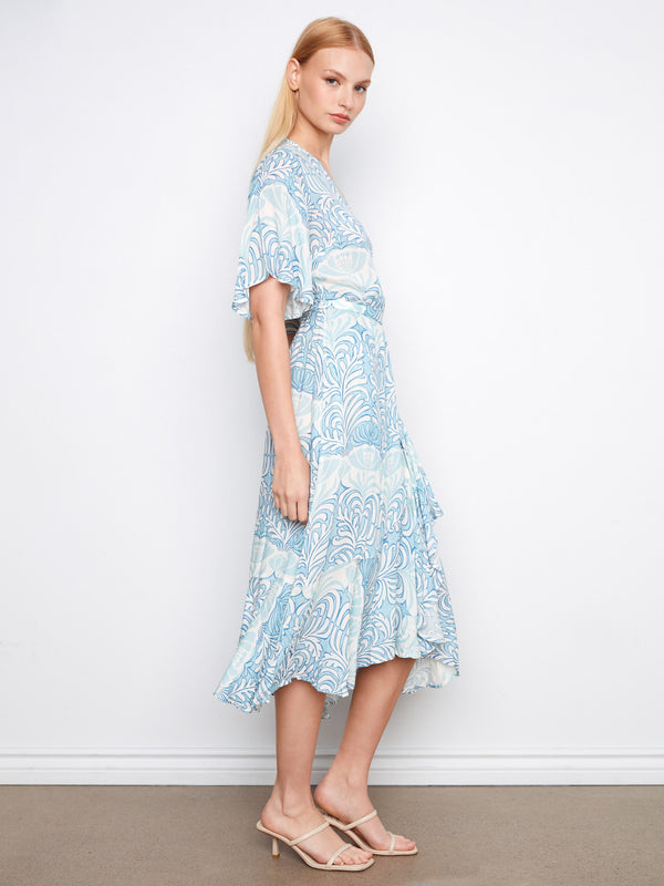 Stylish light blue maxi length dress with an intricate Maeva print and fluttery elbow sleeves by Charlie B.