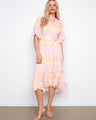 Floral dress with a flattering V-neck and self-tie belt, perfect for summer occasions. Designed for style and comfort by Charlie B.