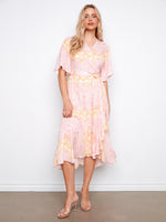 Floral dress with a flattering V-neck and self-tie belt, perfect for summer occasions. Designed for style and comfort by Charlie B.