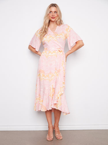 Elegant maxi dress featuring elbow sleeves and a faux wrap design, ideal for any casual or formal event by Charlie B.