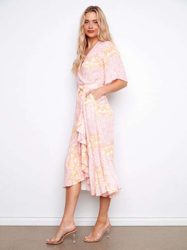 Chic floral maxi dress with a self-tie belt accentuating the waistline, offering both style and comfort by Charlie B.