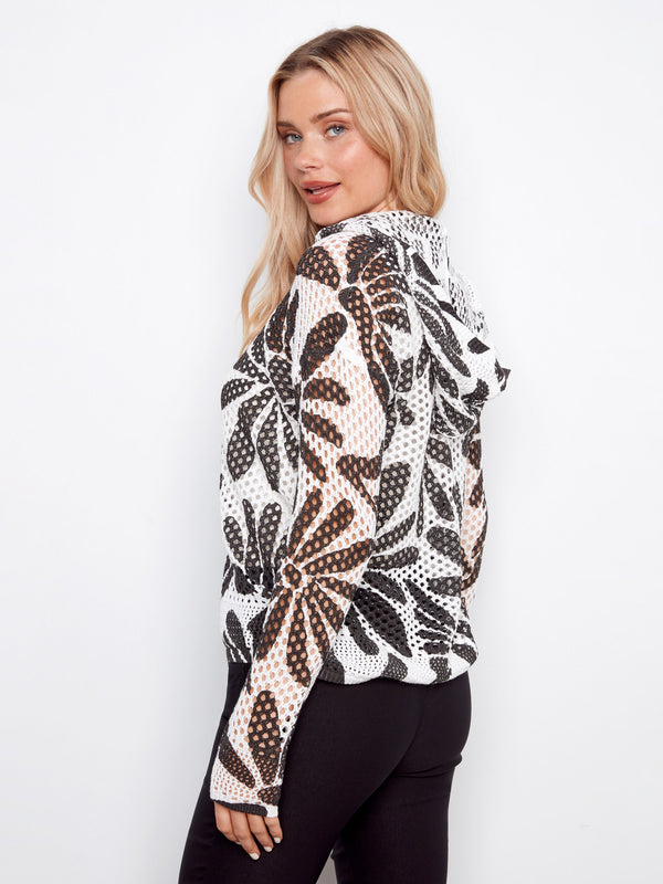 Stylish drop shoulders on this daisy printed fishnet hoodie by Charlie B.