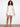 Stylish drop shoulders add a relaxed fit to this colorful crochet piece by Charlie B.
