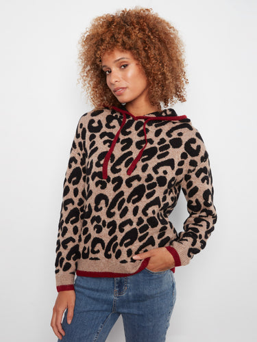 Chic animal print adorns this soft wool-blend knit sweater, adding a wild touch to your wardrobe. By Charlie B.