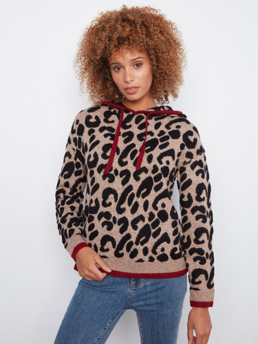 The contrast trims highlight the intricate details in the pattern, making it a standout piece in any wardrobe. By Charlie B.