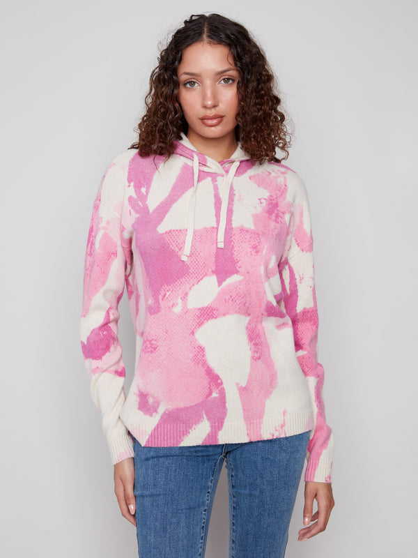 Pink abstract printed hoodie sweater featuring a hood with drawstrings, perfect for casual outings by Charlie B.