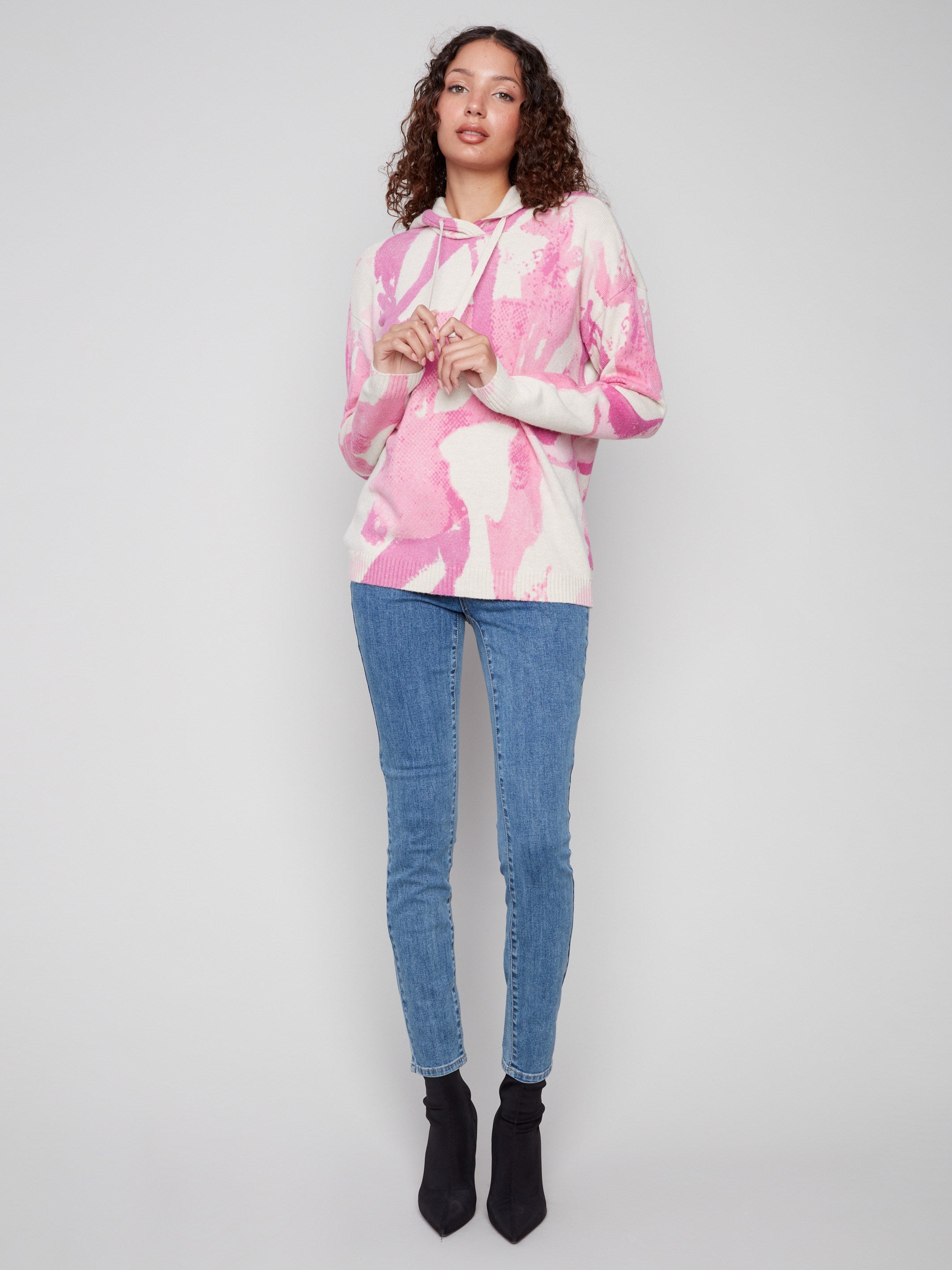 Stylish pink abstract printed hoodie with drop shoulders for a relaxed fit, ideal for everyday wear by Charlie B.
