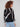 Long sleeves and semi-sheer fabric give this geometric patterned sweater an elegant touch by Charlie B.