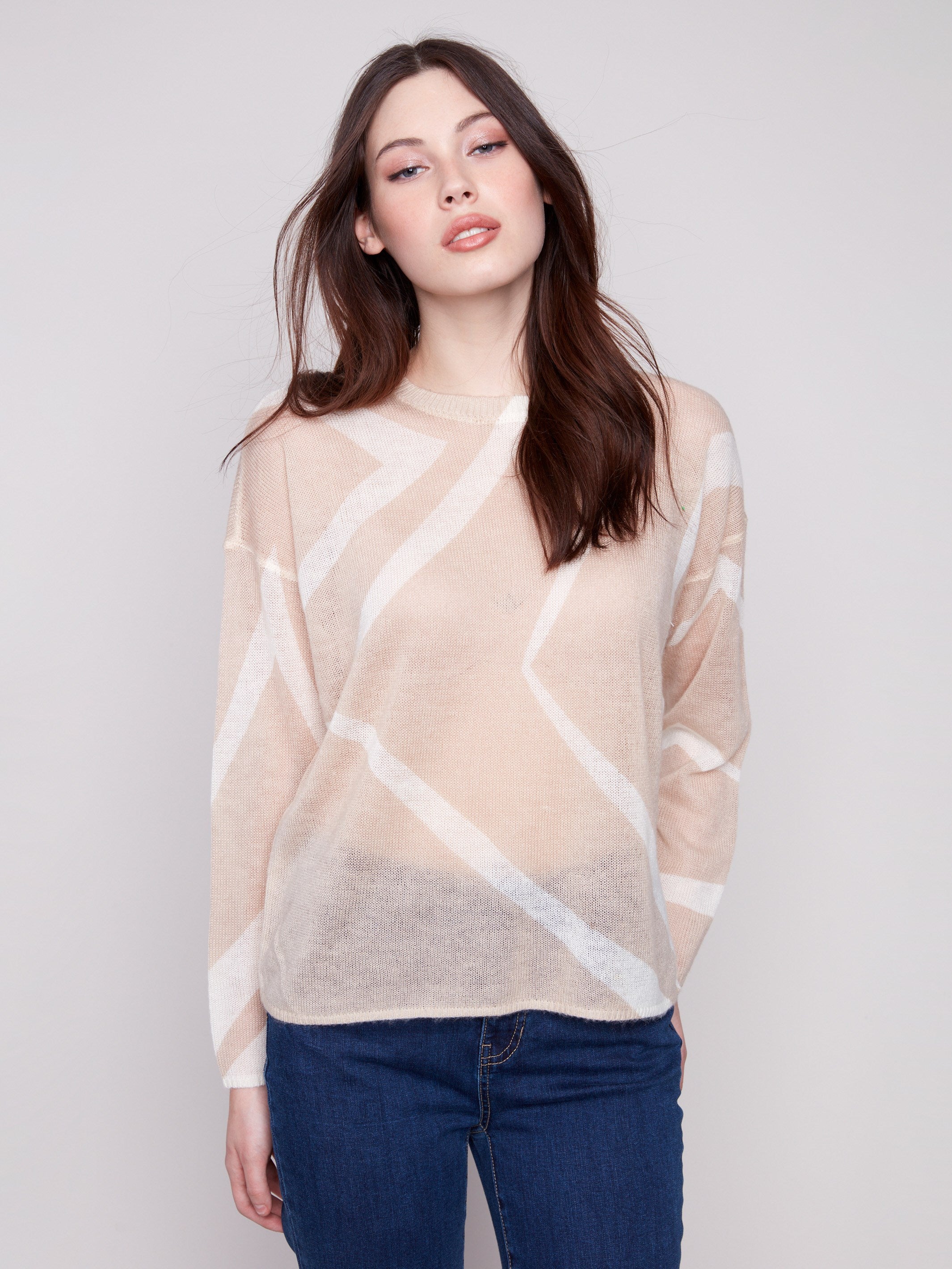 Sesame/Ecru sweater with geometric design, crafted with a crew neck and semi-sheer knit for elegance by Charlie B.