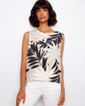 Tropical print top with a crew neckline, perfect for casual outings. Pair it with your favorite bottoms for a chic look by Charlie B.