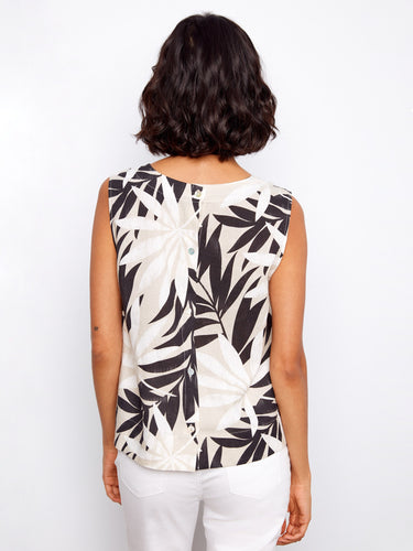 Chic and comfortable, this tropical print top is designed in a relaxed fit. A must-have piece for effortless style by Charlie B.