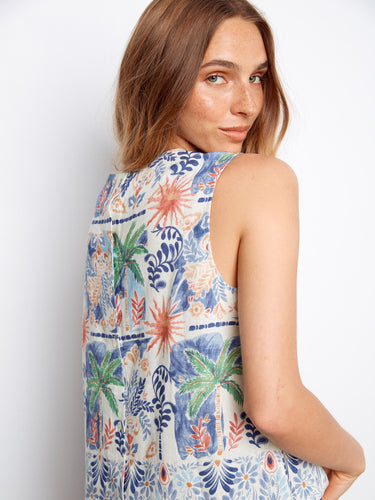 Vibrant floral print blouse with stylish back button detail, offering effortless elegance by Charlie B.