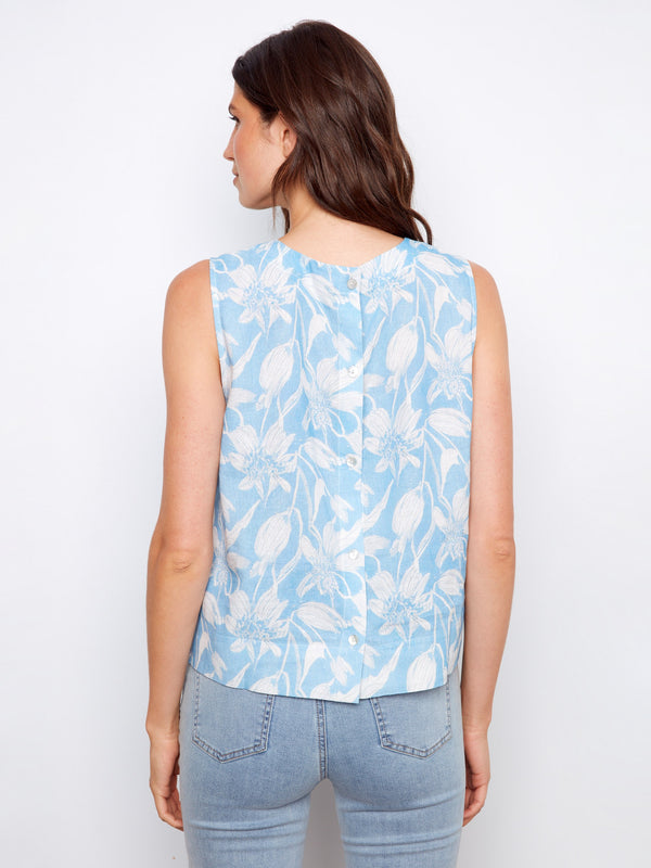 Floral sleeveless top in a relaxed fit, ideal for pairing with jeans or shorts for a casual look. By Charlie B.