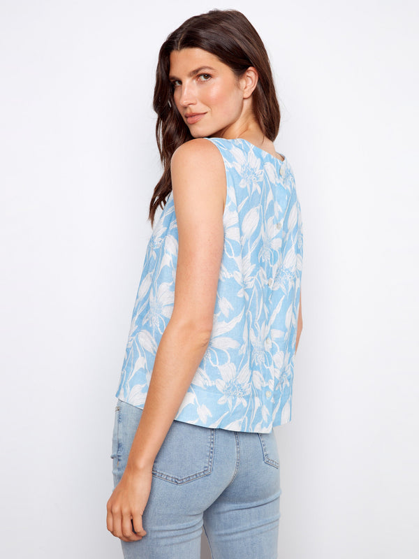 Stylish blue floral print enhances the classic crew neckline of this versatile summer staple. By Charlie B.