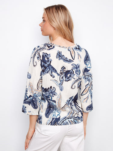 Stylish women's blouse with an eye-catching print and wide 3/4 sleeves, perfect for any occasion by Charlie B.