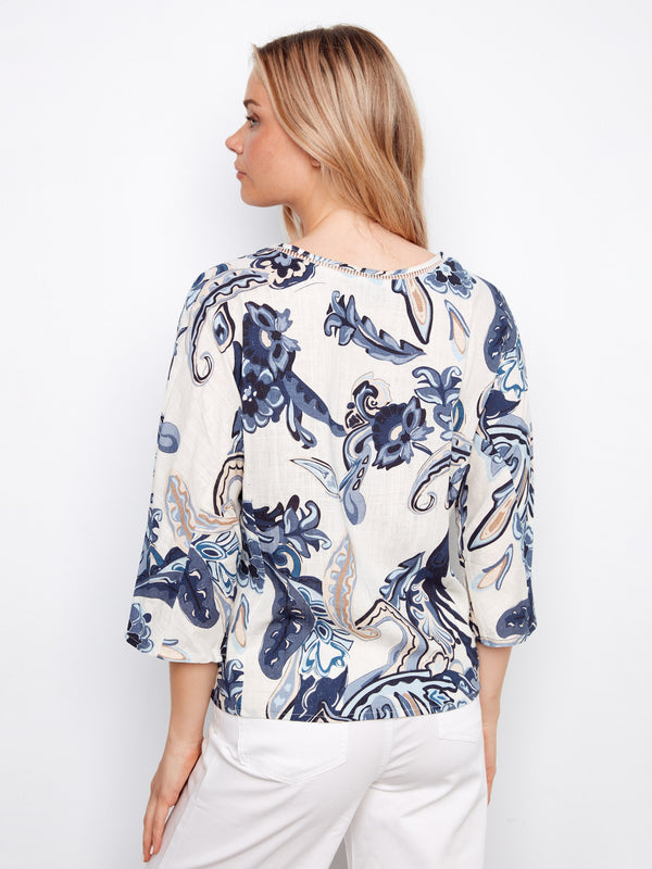 Stylish women's blouse with an eye-catching print and wide 3/4 sleeves, perfect for any occasion by Charlie B.