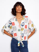 Blouse with postcard print featuring a V-neck and short adjustable sleeves, perfect for casual outings by Charlie B.