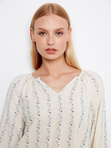 Elegant blouse with elastic cuffs, ensuring a comfortable fit while maintaining a polished look for any occasion by Charlie B.