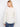 Versatile top showcasing beautiful floral patterns, effortlessly blending comfort and fashion in one piece by Charlie B.