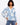 Floral blouse with a crochet trim neckline, featuring raglan sleeves and delicate detailing, perfect for casual elegance by Charlie B.