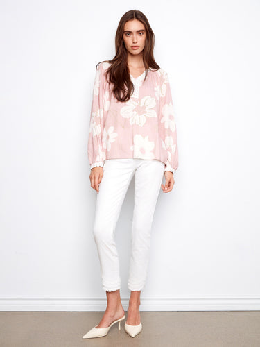 Elegant top with raglan sleeves, showcasing a delicate floral pattern and crochet details. Ideal for everyday wear. By Charlie B.