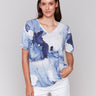 V-neck linen blend T-shirt with a blue abstract print by Charlie B.