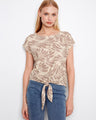 Chic beige blouse with a boat neckline and a stylish front hem tie, perfect for casual outings by Charlie B.