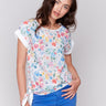 White top with crew neckline and floral print by Charlie B.