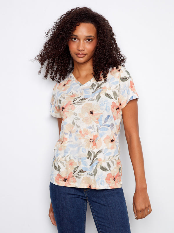 Short-sleeved floral shirt that's ideal for warm weather, combining comfort and style seamlessly by Charlie B.