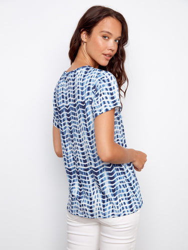 Enjoy the freedom of movement with these short sleeves, ideal for warm weather and versatile styling options by Charlie B.