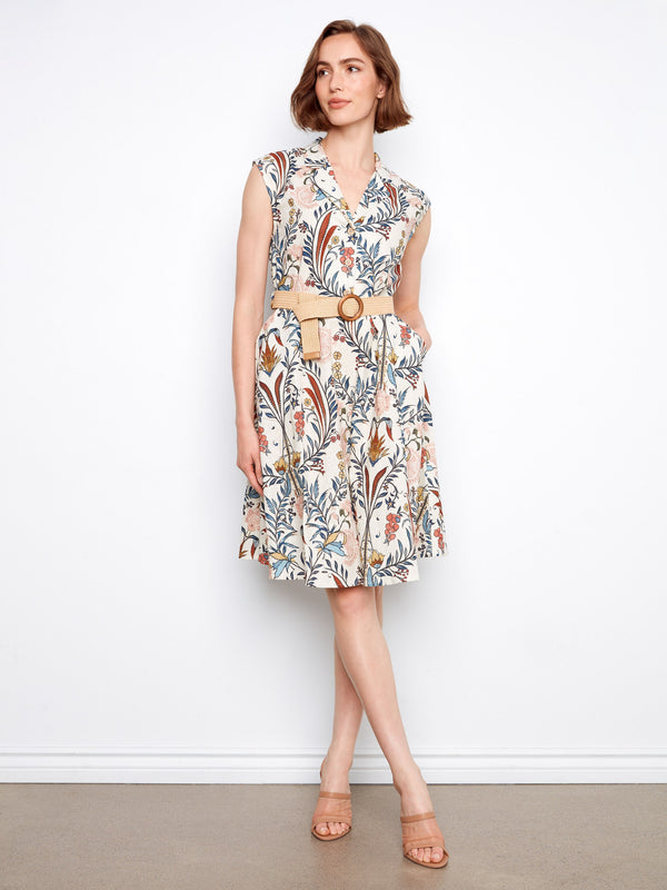 Chic cap sleeves complement the floral print of this elegant dress, ideal for warm weather. By Charlie B.