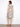 Functional two pockets add practicality to this beautiful floral-patterned dress. Fashioned by Charlie B.