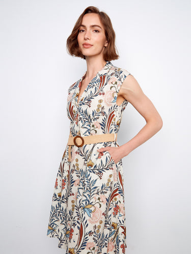 Half-button design adds charm and versatility to this stylishly patterned summer dress. Crafted by Charlie B.