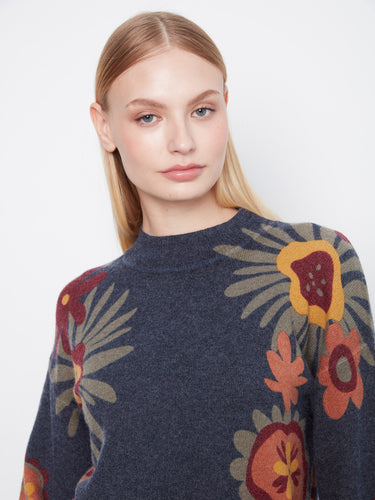 Charming navy sweater with a mock neckline and vibrant floral design by Charlie B.