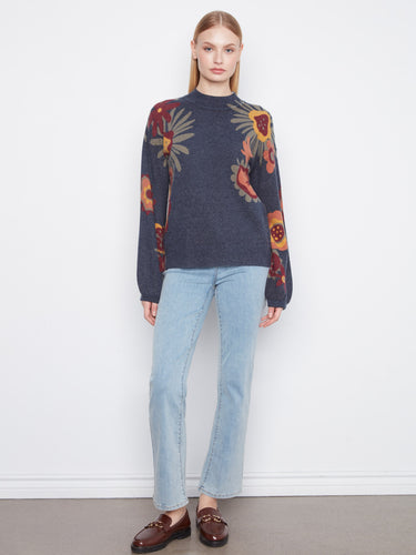 Navy blue sweater adorned with a chic mock neck and colorful floral designs, crafted by Charlie B.