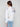 Heather light grey sweater featuring colorful floral prints and a classic mock neck design by Charlie B.