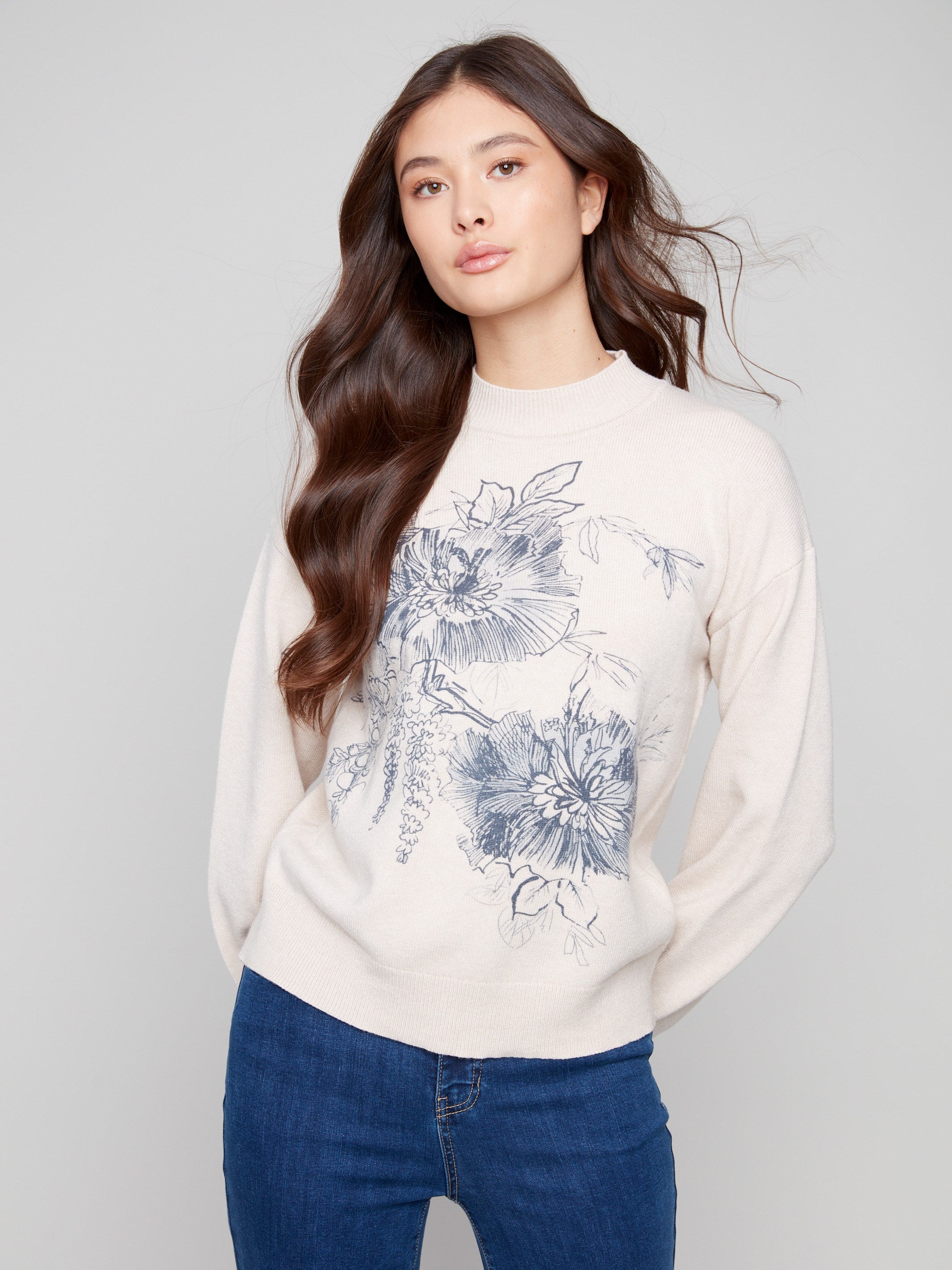 Heather oat sweater with a mock neck and delicate floral print, featuring long balloon sleeves by Charlie B.