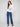 Elegant oat sweater showcasing floral design with elastic cuffs and stylish mock neck by Charlie B.